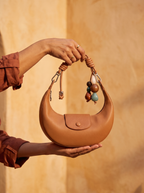 The Demilune in Caramel, held up to the evening sun