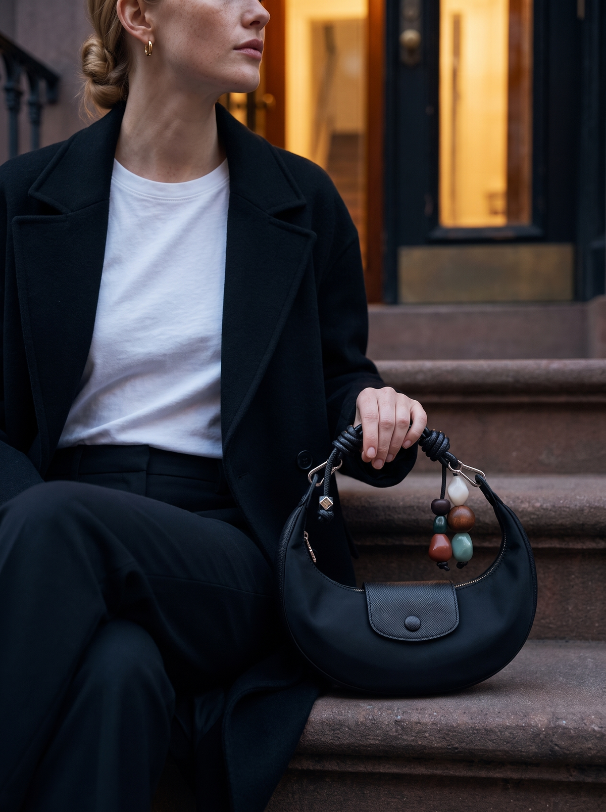 The Demilune in Noir, on a Manhattan brownstone stoop