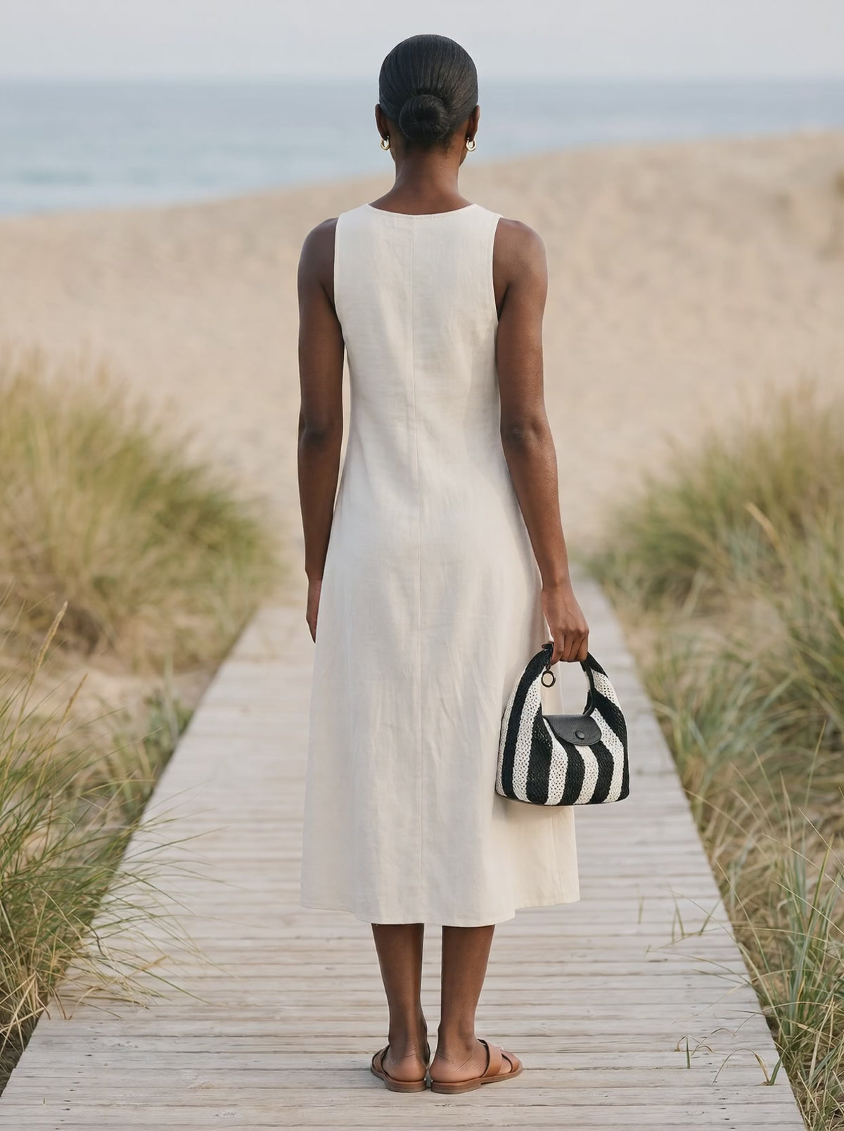 The Deauville in Stripe Noir, boardwalk film, carried in hand
