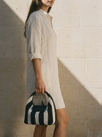 The Deauville in Stripe Noir, held by the wall film