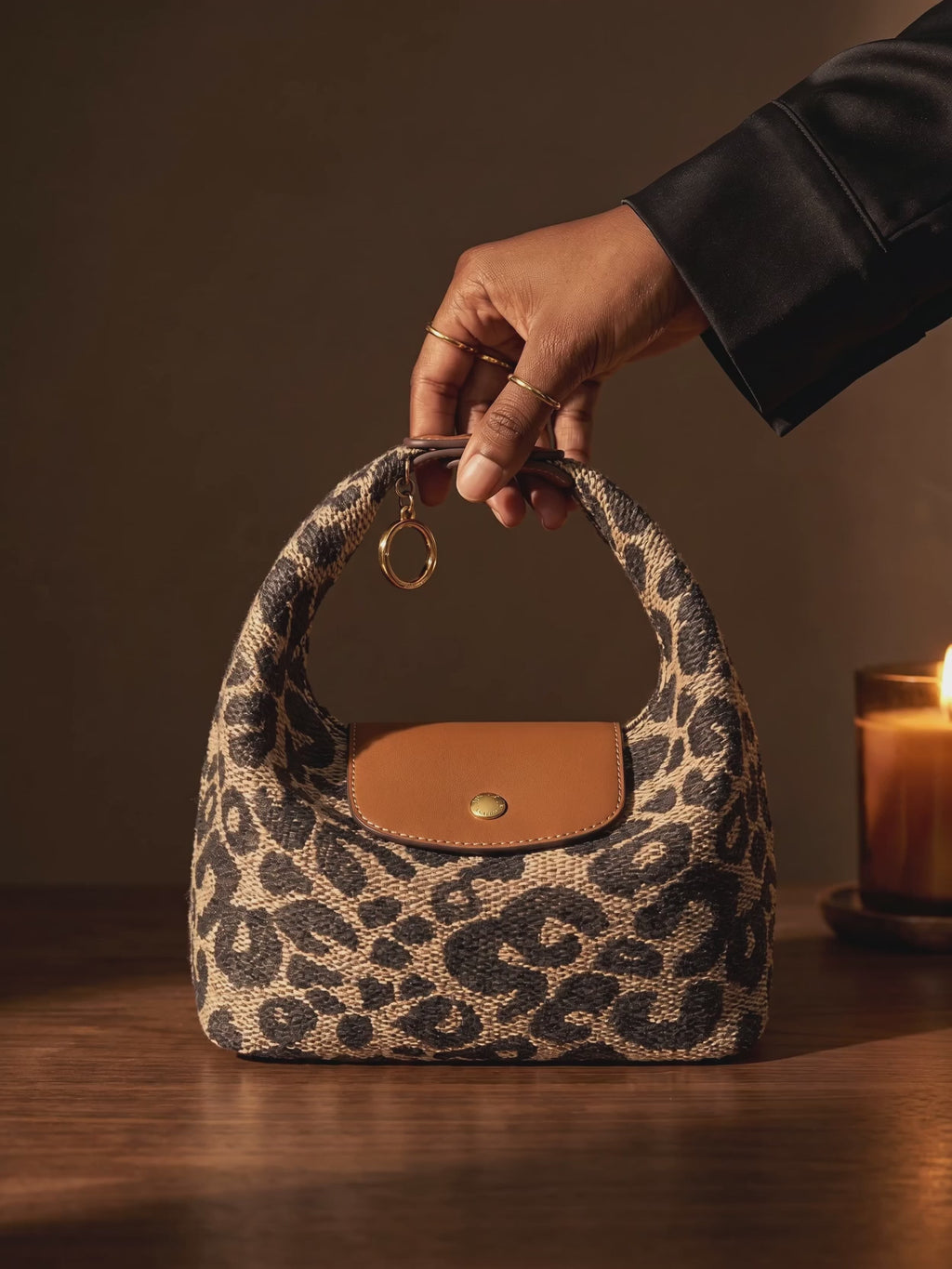The Deauville in Leopard, lifted and turned in candlelight