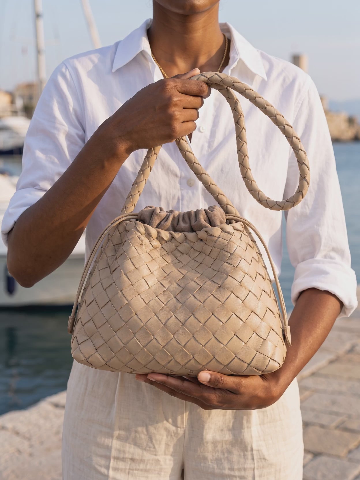 The Antibes in Almond, held in both hands, six second film